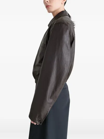 Lemaire Buttoned-up Elasticated Leather Jacket In Burgundy