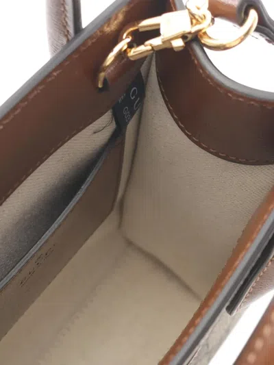 Pre-owned Gucci 2016-2025 Mini Gg Supreme Interlocking G Satchel In Brown