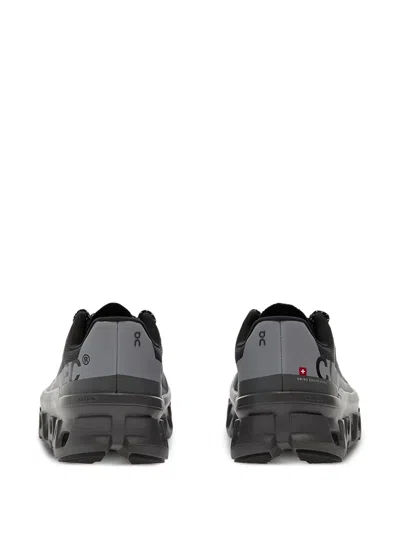 On Cloudmster Lumos Low-top Sneakers In Black