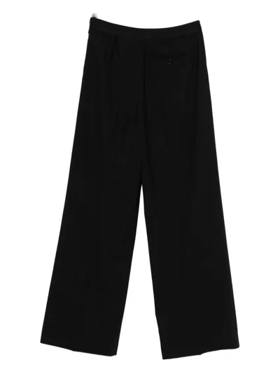 Msgm Logo-waistband Trousers In Black