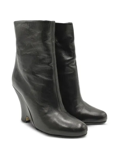 Pre-owned Miu Miu Leather Wedge Ankle Boots In Black