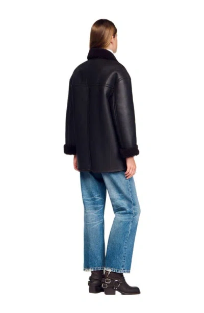 Sandro Shearling Coat In Black