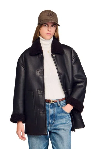 Sandro Shearling Coat In Black