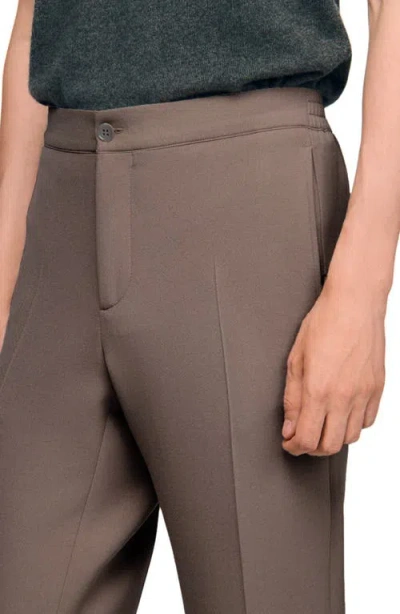 Sandro Jersey Trousers In Brown
