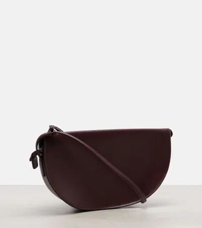 Alaïa East-west Goatskin Shoulder Bag In Burgundy