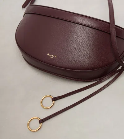 Alaïa East-west Goatskin Shoulder Bag In Burgundy