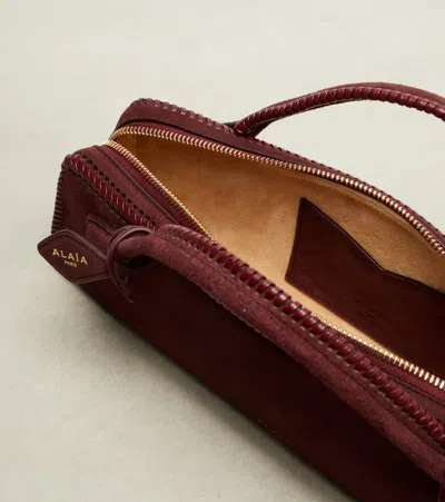 Alaïa Le Teckel Small Suede Clutch In Burgundy