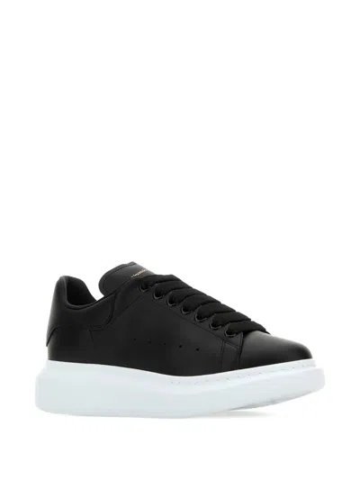 Alexander Mcqueen Black Low Top Sneakers With Logo Lettering On Tongue And Heel In Leather Woman In Black
