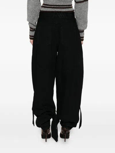 Attico Wide Leg Denim Trousers With Strap And Pockets In Black