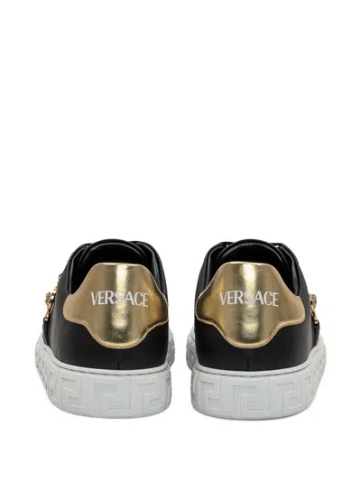 Versace Black Low Top Sneakers With Contrasting Heel With Logo Lettering And Medusa Plaque In Tech Fabric Ma In Black