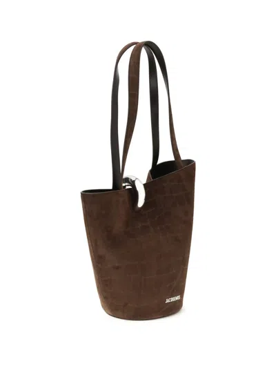 Jacquemus Medium Bucket Bag Featuring Asymmetrical Design In Brown