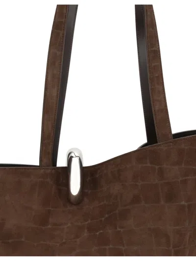 Jacquemus Medium Bucket Bag Featuring Asymmetrical Design In Brown