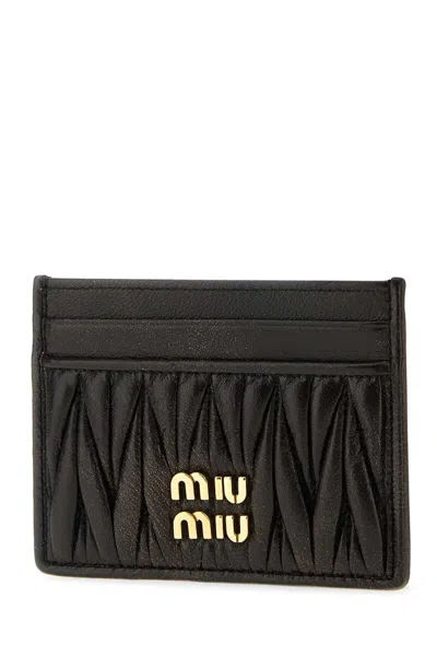 Miu Miu Quilted Black Lamb Leather Compact Wallet In Black