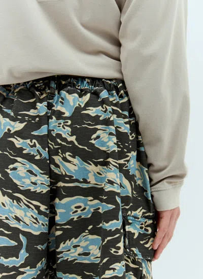 Acne Studios Men Printed Ripstop Shorts In Green