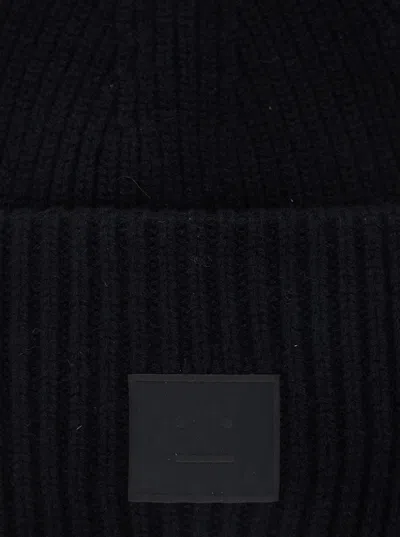 Acne Studios Pansy Face Ribbed Wool-blend Beanie In Black