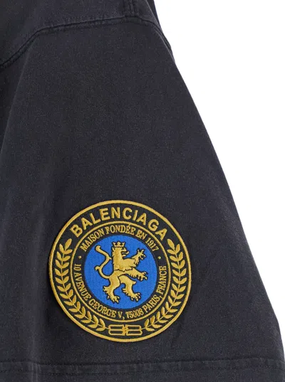 Balenciaga Men Black Crewneck T-shirt With Logo Lettering On The Front And Logo Patch On The Sleeve  In Black