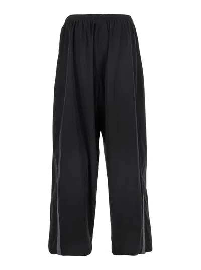 Balenciaga Men Black Oversized Tracksuit Pants With Contrasting Yokes In Tech Fabric Man In Black