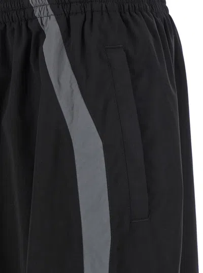 Balenciaga Men Black Oversized Tracksuit Pants With Contrasting Yokes In Tech Fabric Man In Black