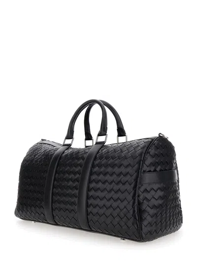 Bottega Veneta Men Black Travel Bag With Intrecciato Motif And Shoulder Strap In Leather Man In Multi