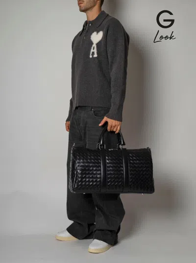 Bottega Veneta Men Black Travel Bag With Intrecciato Motif And Shoulder Strap In Leather Man In Multi