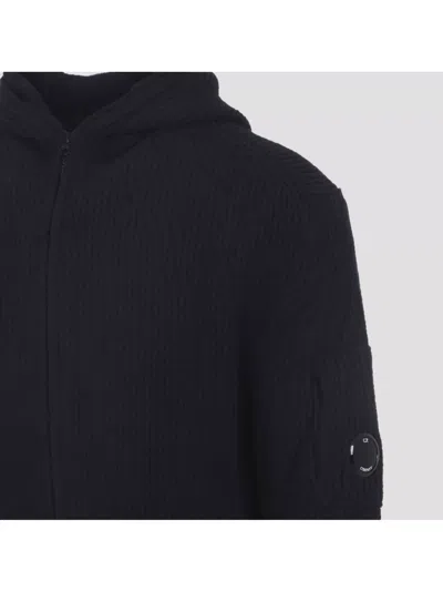 C.p. Company Tailored Hooded Sweater With Zippered Arm Pocket In Black