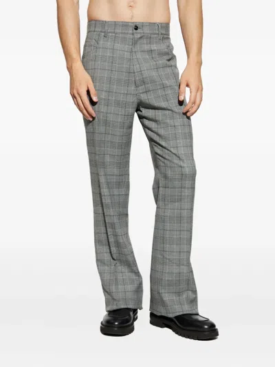 Amiri Checked Flared Trousers In Gray