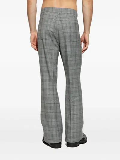 Amiri Checked Flared Trousers In Gray