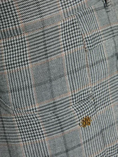 Amiri Checked Flared Trousers In Gray