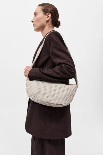 St Agni Lattice Weave Crescent Bag In Sand