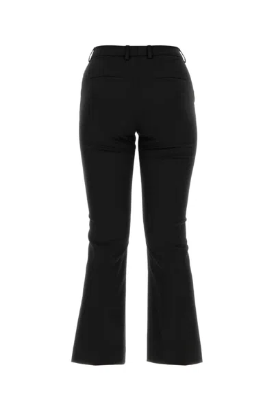 Pt Torino Stretch Polyester Blend Flared Trousers In Black