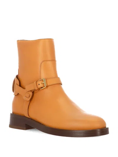 Valentino Buckle-strap Leather Boots In Brown