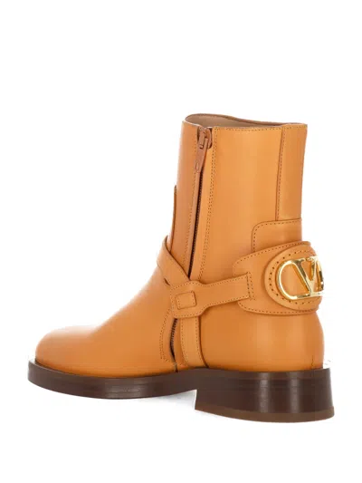 Valentino Buckle-strap Leather Boots In Brown