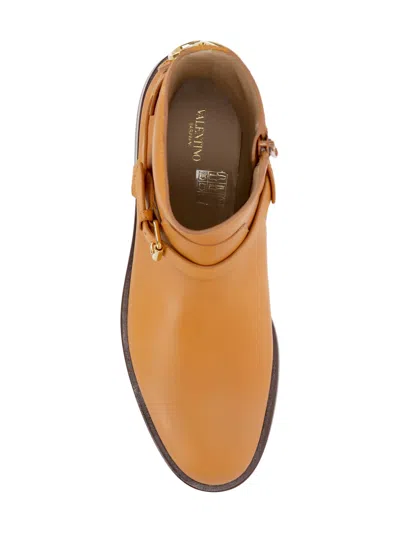 Valentino Buckle-strap Leather Boots In Brown