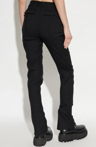 Alexander Mcqueen Tailored Wool Trousers Featuring Flared Hem In Black