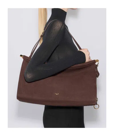 Alaïa Le Click East West Large Bag In Nubuck In Brown