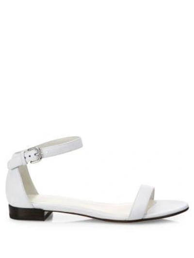 Shop Stuart Weitzman Nudisflat Leather Ankle-strap Sandals In White