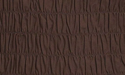 Wayf Matilda Smocked Peplum Top In Brown