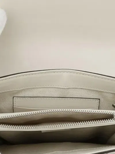 Pre-owned Gucci 2016-2025 Gg Embossed Flap Satchel In White