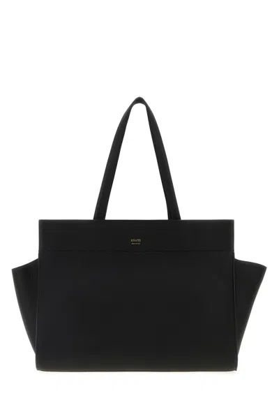 Khaite Pebbled Leather Zip Handbag In Black