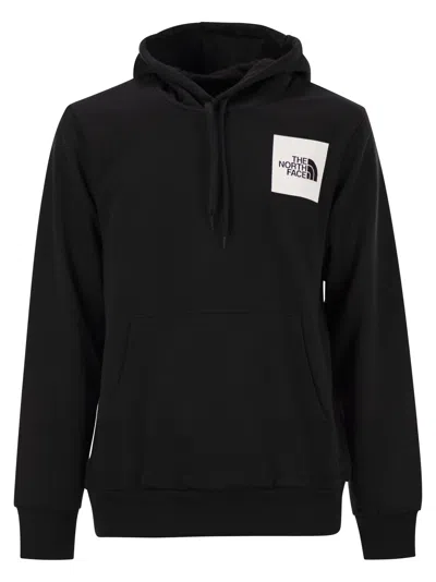 The North Face Logoed Hoodie In Black