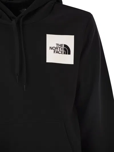 The North Face Logoed Hoodie In Black