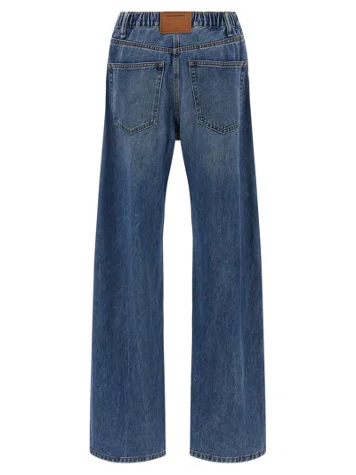 Alexander Wang Embossed Logo Jeans In Blue