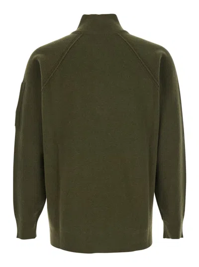 C.p. Company Men Green Turtleneck Sweater With Logo Plaque On The Sleeve In Wool Man In Multi
