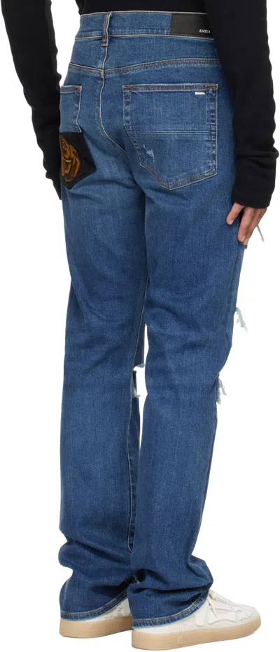 Amiri Thrasher Slim Fit Distressed Floral Velvet Patch Jeans In Blue