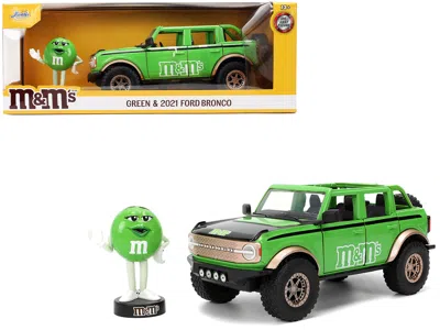 Jada 2021 Ford Bronco Green With Black Stripes And Green M & M's Diecast Figure "hollywood Rides" Series  In Green