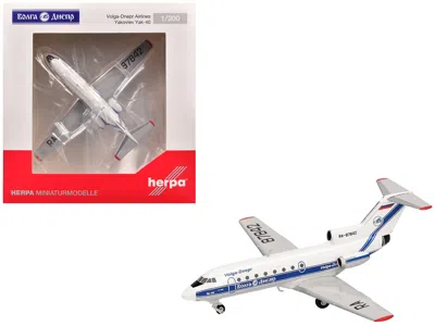 Herpa Yakovlev Yak-40 Commercial Aircraft "volga-dnepr Airlines" (ra-87842) White With Blue Stripes 1/200  In Multi