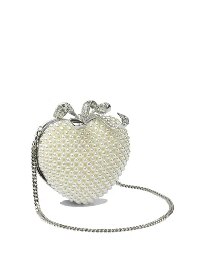 Self-portrait Heart-shaped Clutch In Sand