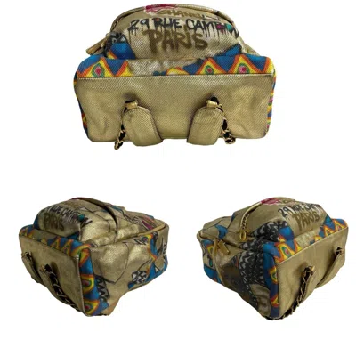 Pre-owned Chanel Gold Multi-color Coated Canvas Backpack ()