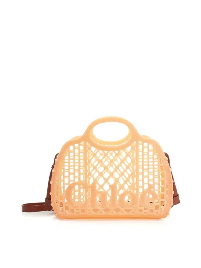 Chloé Cage Leather-trimmed Studded Rubber Shoulder Bag In Sand