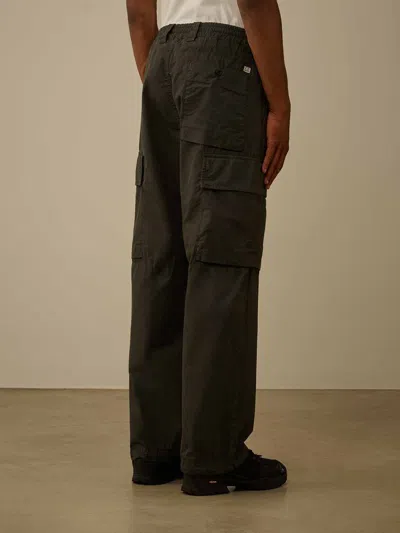 C.p. Company Cargo Pocket Trousers In Black